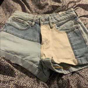 A pair of shorts that are all different colors